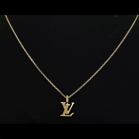 gold louis vuitton necklace|louis vuitton monogram locket necklace.